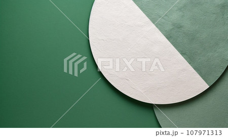 Round cut paper green and white color with minimal composition, paper texture background, eco friendly and nature concept, abstract background. Generative AI Round cut paper green and white color with minimal composition, paper texture background, eco friendly and nature concept, abstract background. Generative AI 107971313