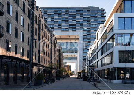 Cologne Kranhaus is a modern business center on the bank of Rhine river, Cologne, Germany 107974827