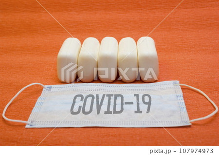 Many pieces soap and mask - protection quarantine, coronavirus, lettering covid19 Many pieces soap and mask - protection quarantine, coronavirus, lettering covid19 107974973