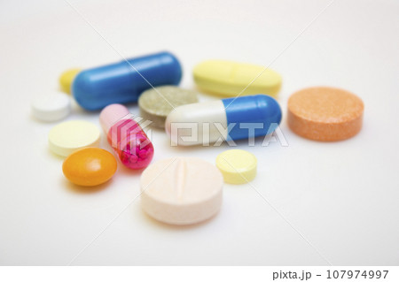 Many tablets and capsules - protection during quarantine, coronavirus, covid19 107974997