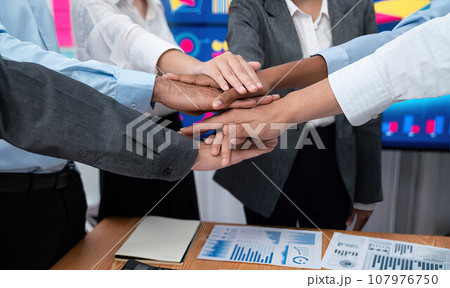 Office worker's hand stack shows solidarity in workplace. Concord Office worker's hand stack shows solidarity in workplace. Concord 107976750