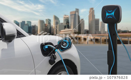 Electric car plugged in with charging station with city background. Peruse 107976828