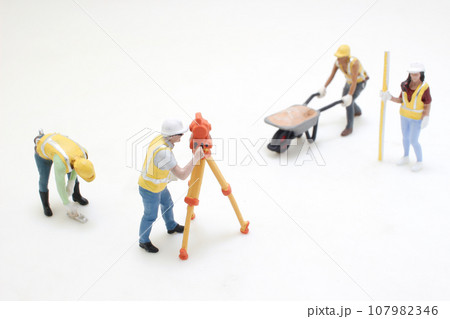 the figure of Surveyor at the construction site 107982346