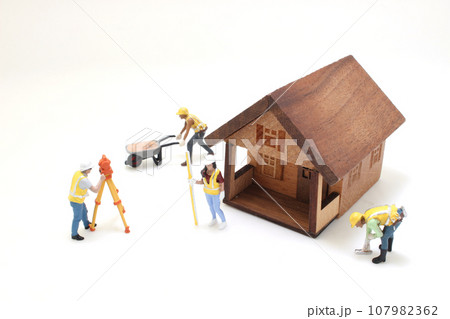 the figure of Surveyor at the construction site 107982362