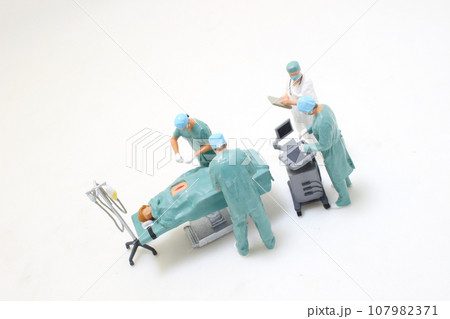 a doctor in cutting thread with scissors, teamwork and support 107982371