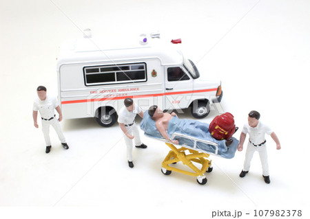 a Paramedics React Quick to Bring Injured Patient a Paramedics React Quick to Bring Injured Patient 107982378