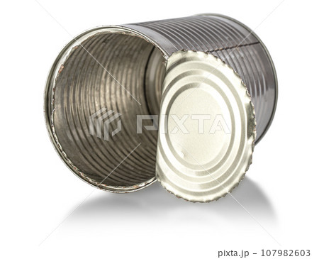Opened empty iron chrome tin can on a white background. Aluminum trash on insulation. Opened empty iron chrome tin can on a white background. Aluminum trash on insulation. 107982603