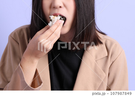 Hand Holding Food 107987849