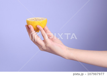 Hand with Fruit 107987977