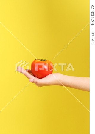 Hand with Fruit 107988078