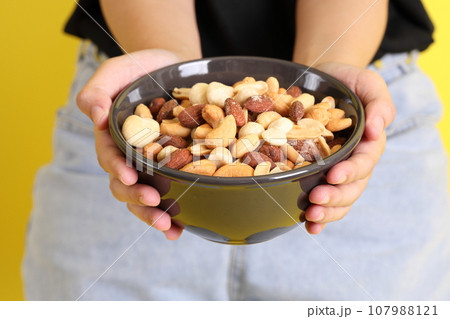 Hand with Snack Hand with Snack 107988121