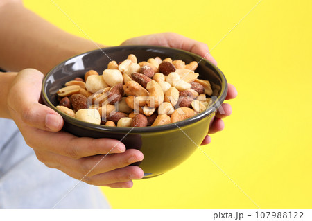 Hand with Snack Hand with Snack 107988122