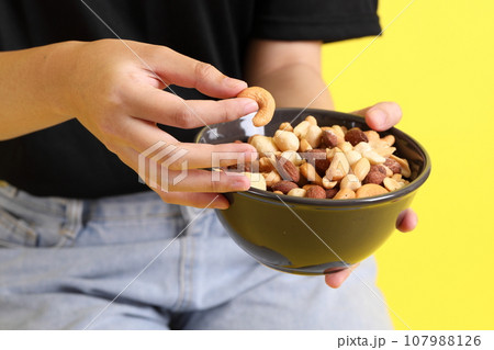 Hand with Snack Hand with Snack 107988126