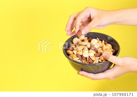 Hand with Snack Hand with Snack 107988171