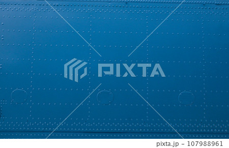 Abstract background from the metal skin of the aircraft. Abstract background from the metal skin of the aircraft. 107988961