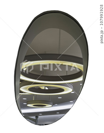 See the Hanging rounded ceiling mounted light fixtures with modern LED light bulb. Looking through Glass wall panels isolated on white background with clipping path. 107991928