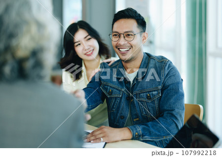 The bank's credit officer released the loan after a male business owner entered into an insurance contract using the mortgaged home property. The bank's credit officer released the loan after a male business owner entered into an insurance contract using the mortgaged home property. 107992218