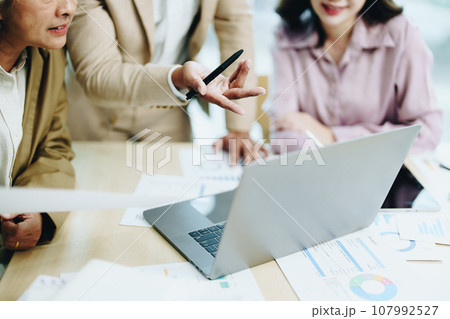 Asian entrepreneurs and business people meeting in a conference room in business planning, financial budget and investment risk assessment to analyze customer groups to increase company growth. 107992527