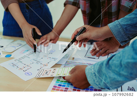 Team of Creative Web, Graphic Designer planning for mobile phone, drawing website ux ui app for mobile phone application and development template layout, process to developing prototype wireframe Team of Creative Web, Graphic Designer planning for mobile phone, drawing website ux ui app for mobile phone application and development template layout, process to developing prototype wireframe 107992682