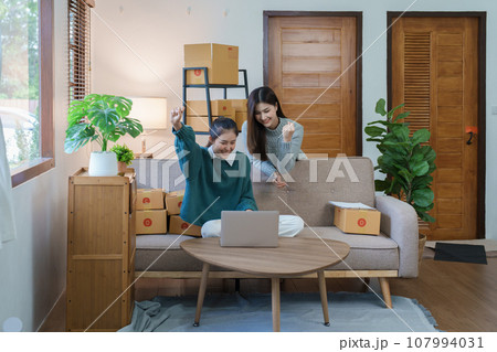 Starting small business entrepreneur of independent Asian woman smiling using computer laptop with cheerful success of online marketing Starting small business entrepreneur of independent Asian woman smiling using computer laptop with cheerful success of online marketing 107994031