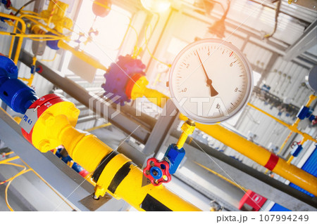 View of pressure gauge on gas distribution station equipment. Pressure sensor for natural gas supply View of pressure gauge on gas distribution station equipment. Pressure sensor for natural gas supply 107994249