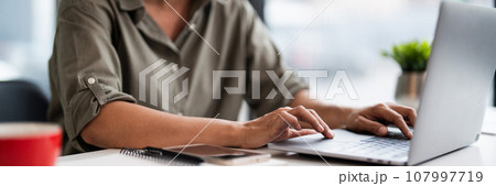 Asian casual businesswoman use laptop to working about growth finance report of new startup project Asian casual businesswoman use laptop to working about growth finance report of new startup project 107997719