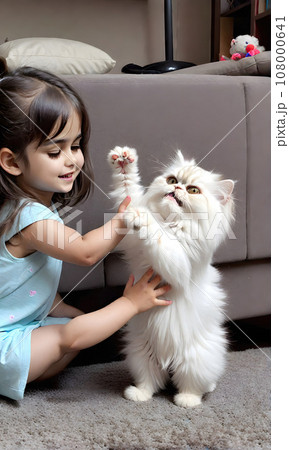 A little girl holds a Persian cat in her arms. Vertical image 108000641