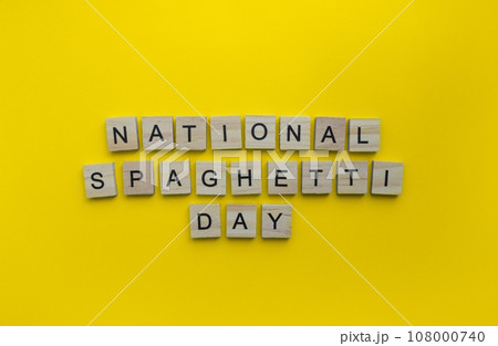 January 4, National Spaghetti Day, minimalistic banner with the inscription in wooden letters 108000740