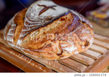 Traditional sourdough bread, close-up view 108002178
