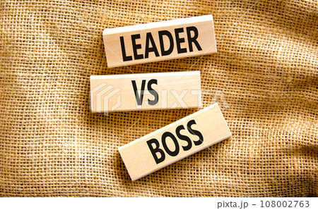 Boss vs leader symbol. Concept words Boss vs versus leader on wooden block. Beautiful canvas table canvas background. Business motivational boss vs leader concept. Copy space. Boss vs leader symbol. Concept words Boss vs versus leader on wooden block. Beautiful canvas table canvas background. Business motivational boss vs leader concept. Copy space. 108002763
