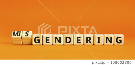 Gendering or misgendering symbol. Concept words Gendering Misgendering on wooden blocks. Beautiful orange table orange background. Gendering or misgendering concept. Copy space. Gendering or misgendering symbol. Concept words Gendering Misgendering on wooden blocks. Beautiful orange table orange background. Gendering or misgendering concept. Copy space. 108002800