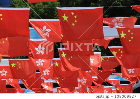 Chinese and hong kong flag set up in the event for celebrating the National Day of the People's Republic of China 74 th anniversary in sheung wan , Hong Kong 108009827