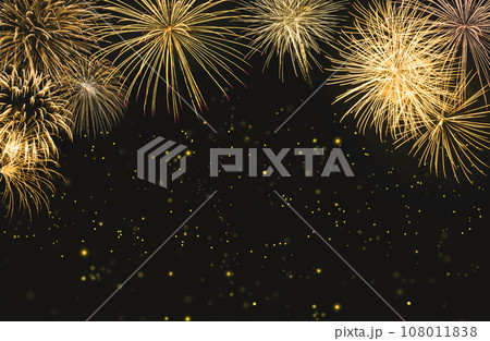 Golden fireworks on black background with sparks. New year celebration concept. 108011838