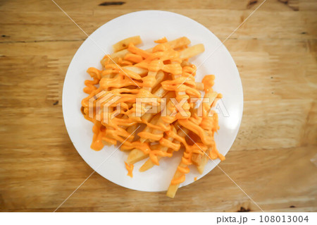 French fries or fried potato ,cheese fries French fries or fried potato ,cheese fries 108013004
