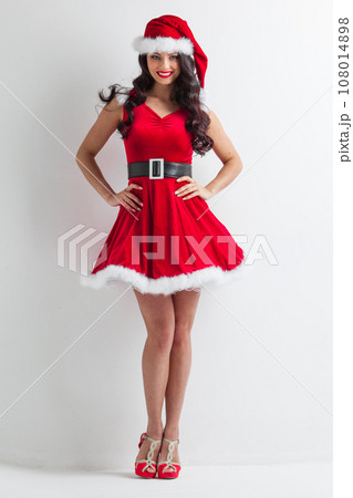 Girl wearing santa claus clothes Girl wearing santa claus clothes 108014898