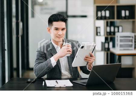 Mature business man executive manager looking at laptop watching online webinar training or having virtual meeting video conference doing market research working in office.. 108015368