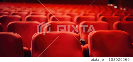 Empty cinema hall with red seats. Movie theatre 108020366