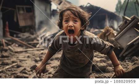 A frightened boy on the wreckage of a house A frightened boy on the wreckage of a house 108020959