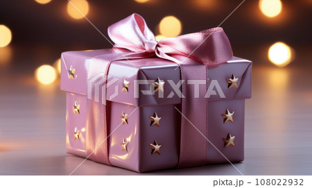 Luxury gift box with romantic candles on the table, festive still life, blurry background 108022932