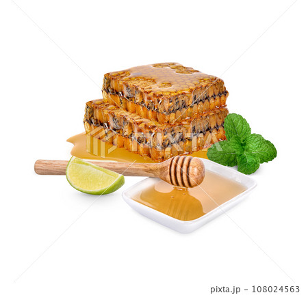 Honeycomb and lime with mint isolated on white background Honeycomb and lime with mint isolated on white background 108024563