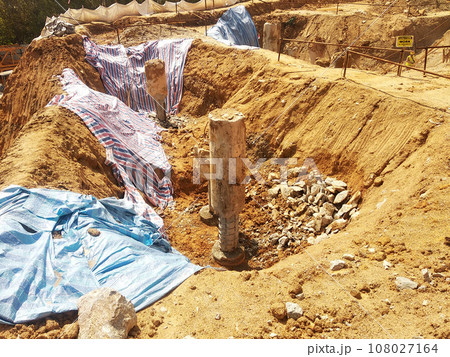 JOHOR, MALAYSIA - SEPTEMBER 03, 2020: Bore pile that has been driven into the ground and reached the required depth. It will be cut and then a pile cap will be built over it. 108027164