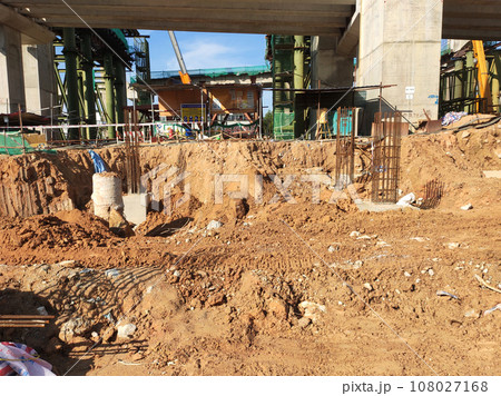 JOHOR, MALAYSIA - SEPTEMBER 03, 2020: Bore pile that has been driven into the ground and reached the required depth. It will be cut and then a pile cap will be built over it. 108027168