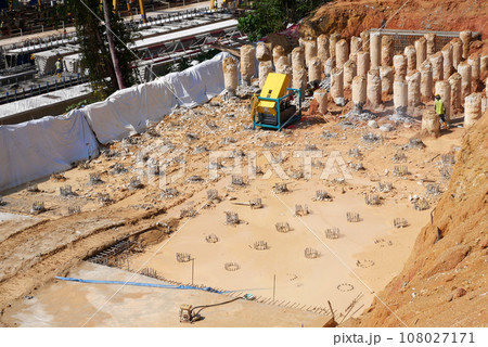 JOHOR, MALAYSIA - SEPTEMBER 03, 2020: Bore pile that has been driven into the ground and reached the required depth. It will be cut and then a pile cap will be built over it. 108027171
