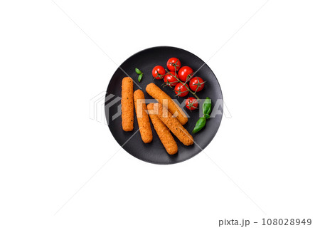 Delicious crispy cheese sticks with mozzarella, salt and spices, breaded and fried in oil 108028949