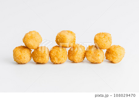 Breaded Chicken Inner Fillet on a White Background,Chicken Breaded Raw Meat.Chicken Breaded Fillet. Breaded chicken nuggets. Fast homemade food at home. Chicken breaded schnitzels. Fast cooking. 108029470