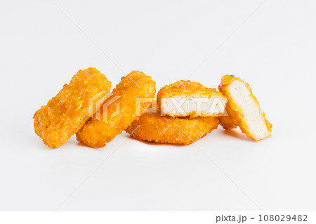 Chicken Breaded Fillet. Breaded chicken nuggets. Fast homemade food at home. Chicken breaded schnitzels. Breaded Chicken Inner Fillet on a White Background,Chicken Breaded Raw Meat. Fast cooking. Chicken Breaded Fillet. Breaded chicken nuggets. Fast homemade food at home. Chicken breaded schnitzels. Breaded Chicken Inner Fillet on a White Background,Chicken Breaded Raw Meat. Fast cooking. 108029482