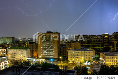 Lightning in the night sky during a thunderstorm in the center of the Russian capital. Lightning in the night sky during a thunderstorm in the center of the Russian capital. 108029664