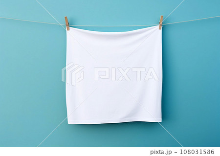 Clean white sheet drying on a line. Laundry with clothes pins on a rope. Clean clothesline dry laundry line. Empty space for text, mockup 108031586