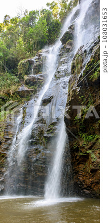 Moss at the waterfall inside the rainforest 108031653