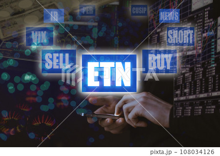 スマートフォンでの株式取引のイメージ ETN 108034126